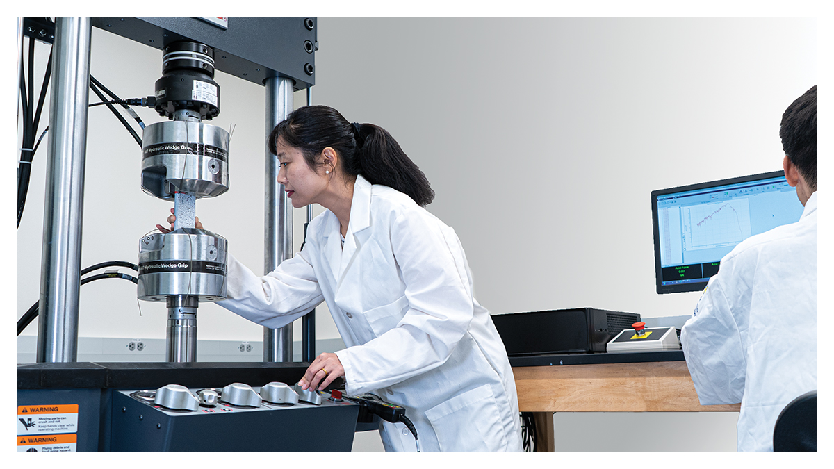 Mo Li working in her lab conducting samples of next generation materials